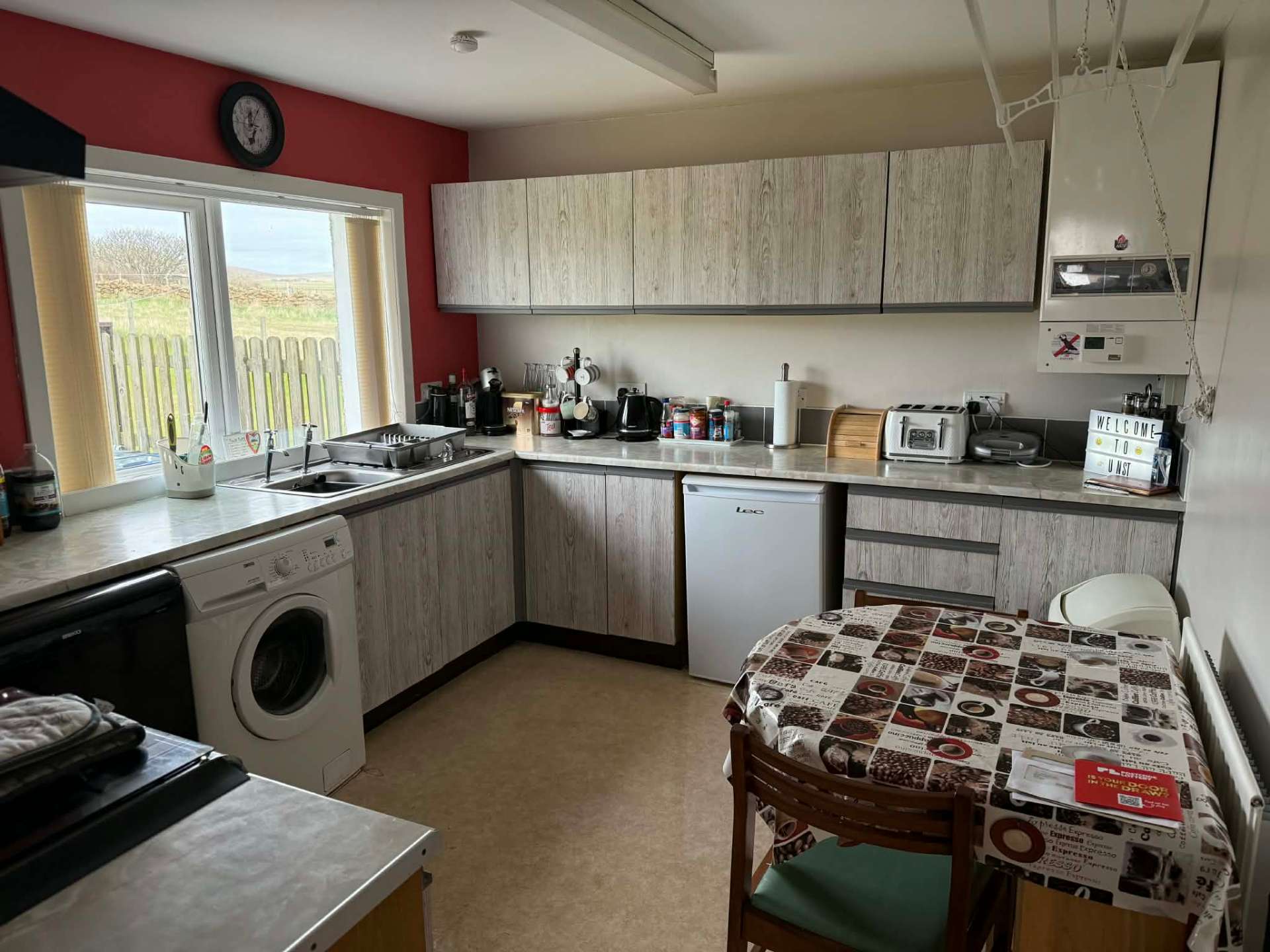 Fully equipped kitchen with dining table